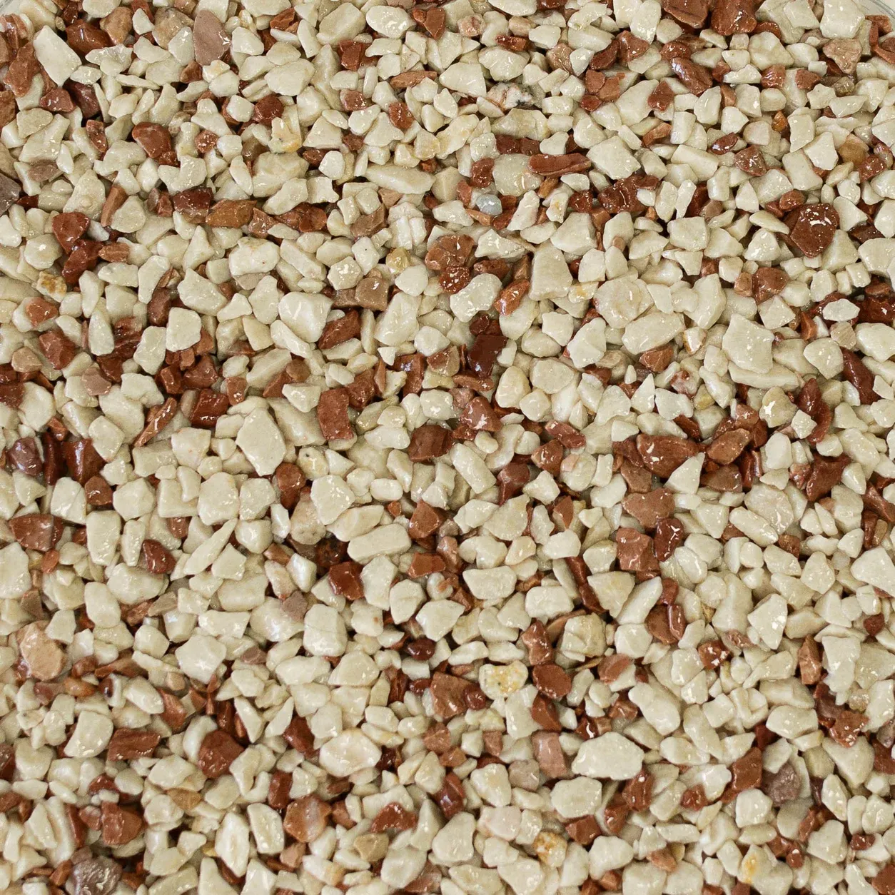 Muestra de árido para stone carpet, acabado Carmen: Crema y rojo
