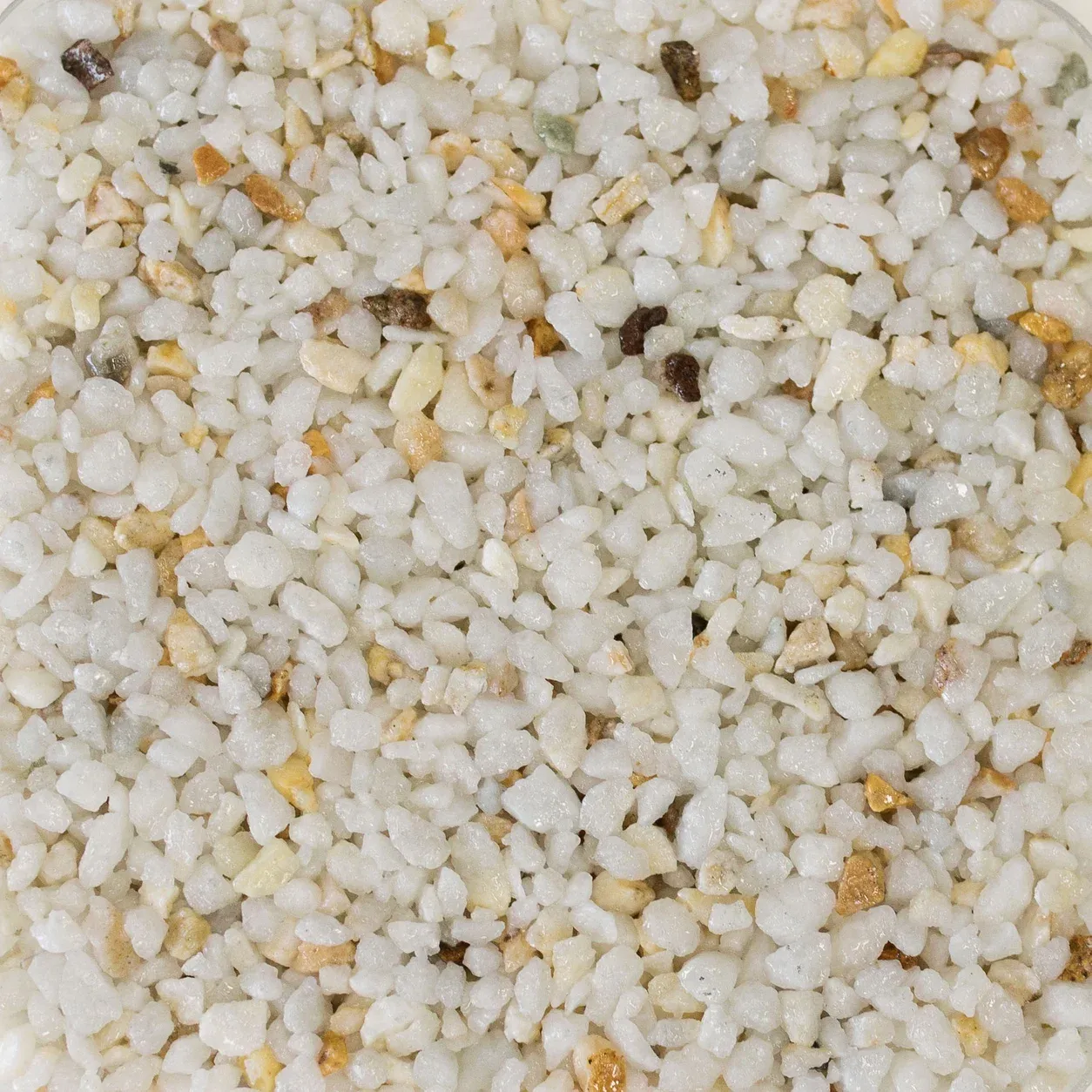 Muestra de árido para stone carpet, acabado Juan: Blanco veteado